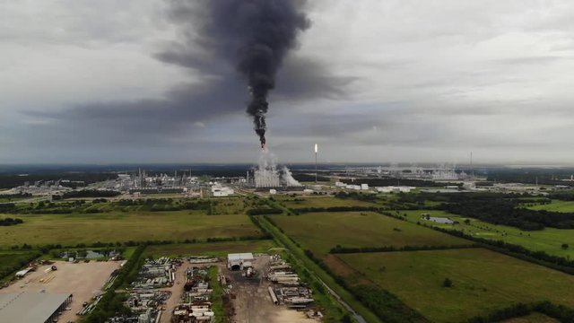 Chemical Plant Conducting Controlled Flaring to Burn Off Excess Materials in Channelview near Houston, Texas Filmed by Drone