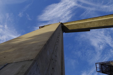 under a ski jump, blue sky