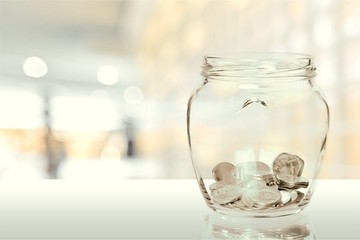 Money Jar with  coins on white background