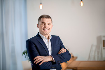 Mature man in elegant suit indoors