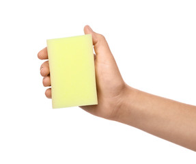 Woman holding cleaning sponge for dish washing on white background, closeup