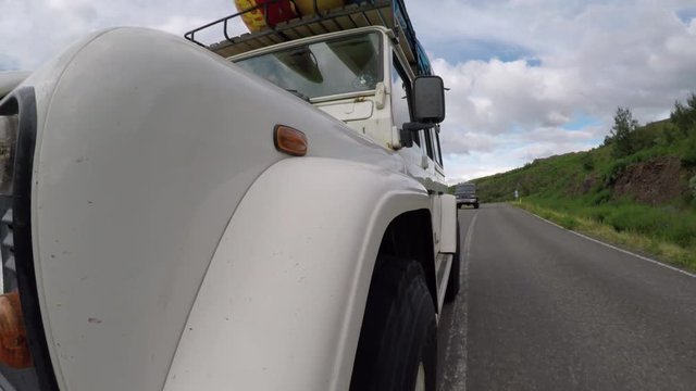 Driving on roadway in Iceland, POV close up