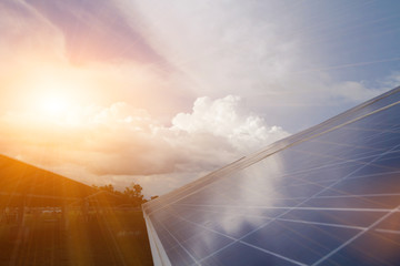 Fototapeta premium Solar energy with blue sky, It's clean and energy for free use. This is a system that adjusts to the sun