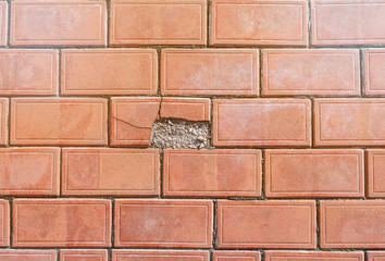 Paving stone-color of red clay with one dilapidated site
