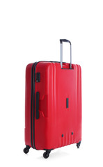 Red suitcase for travelling on white background
