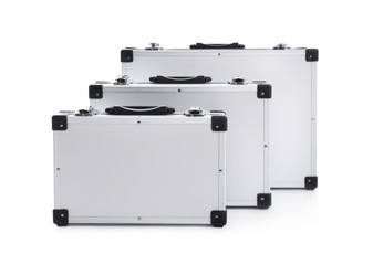 Set of modern suitcases on white background