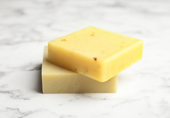 Hand made soap bars on marble background