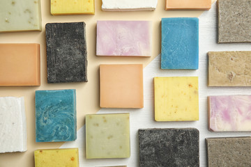 Hand made soap bars on color background, top view - obrazy, fototapety, plakaty