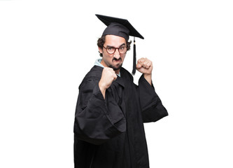 graduate bearded man with an angry, aggressive and menacing pose, ready for the fight, showing...