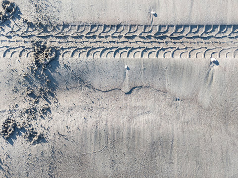 More Tyre Tracks Impression In Rippling Sand	