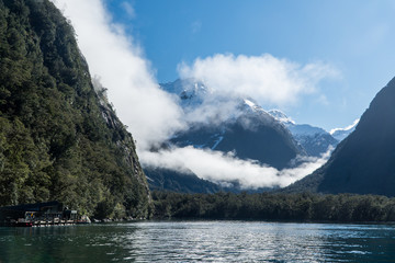 Fototapeta premium Looking through the valley in Milford Sound with underwater observatory in view