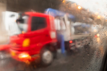 Abstract blur  image of a truck in the rain