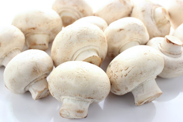 champignon mushrooms, on a light background, healthy diet,