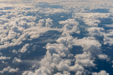Fototapeta na wymiar The cloud on sky from airplane window view