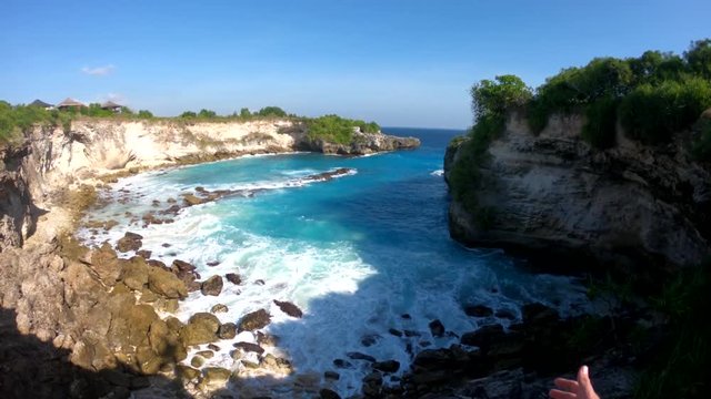 Tilt Down POV, Sitting On Rocky Coastline