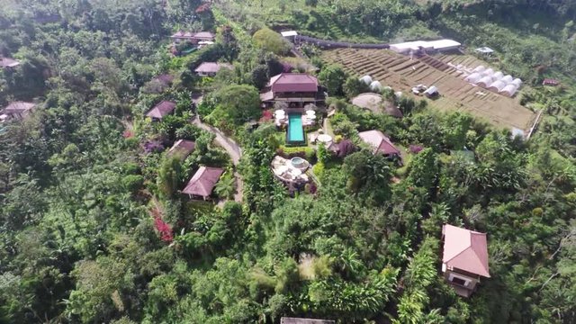 Aerial, tropical resort in mountains