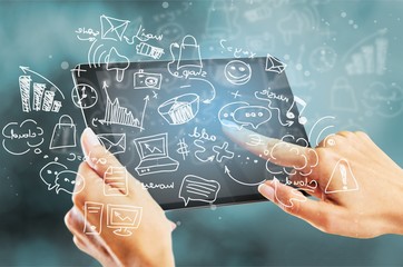 Woman holding digital tablet on background