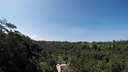 Person swings in slow motion, POV