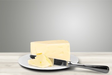 Pat of fresh farm butter on a