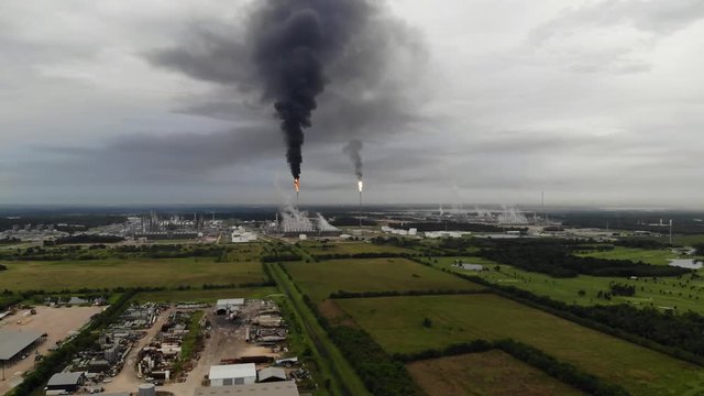 Chemical Plant Conducting Controlled Flaring to Burn Off Excess Materials in Channelview near Houston, Texas Filmed by Drone