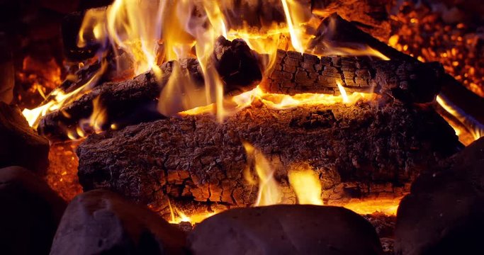 C4K closeup shot of the burning campfire