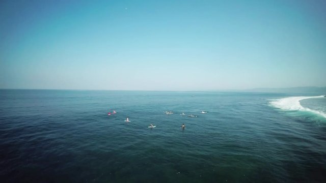 Surfers off Mentawai Island coast, aerial