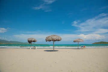Beach umbrellas on Caribbean sea