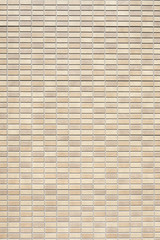 ベージュ色のタイル壁