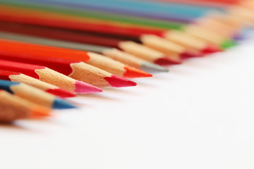 Obraz premium Color pencils on white background.Selective focus.