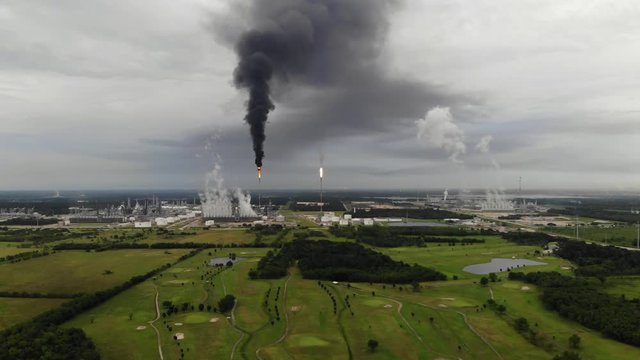 Chemical Plant Conducting Controlled Flaring to Burn Off Excess Materials in Channelview near Houston, Texas Filmed by Drone