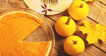 Tasty pumpkin pie on background