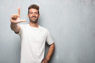 young handsome man gesturing 
