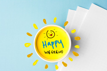 Happy weekend quote and coffe cup on blue background. Time to break concept. - obrazy, fototapety, plakaty