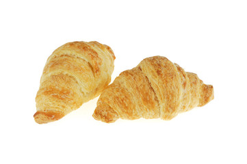 close up on buttery croissants isolated on white background