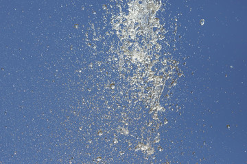 drops water of the fountain in the sky