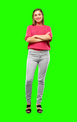 young woman full body. with a proud, satisfied and happy look on face, smiling with arms crossed