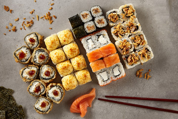 Big Set of Various Maki Sushi or Norimaki Rolles Top View