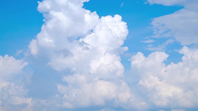 Time-lapse scene of beautiful clouds on blue sky.