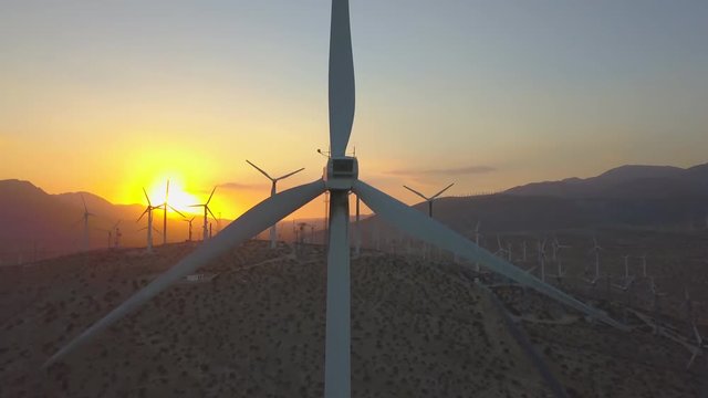 Windmill Windfarm at Dusk Aerial - Generating Clean Electricity
