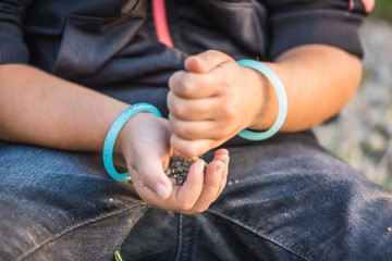 Close view of little girl hands while playing
