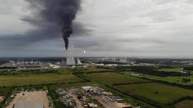Chemical Plant Conducting Controlled Flaring to Burn Off Excess Materials in Channelview near Houston, Texas Filmed by Drone