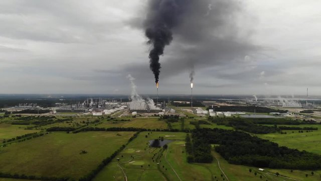 Chemical Plant Conducting Controlled Flaring to Burn Off Excess Materials in Channelview near Houston, Texas Filmed by Drone
