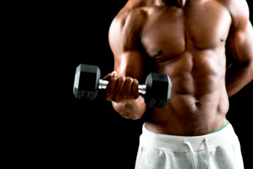 Fototapeta na wymiar man big muscles doing exercises