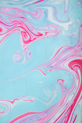 Abstract colored background. Stains of paint on the water. Ebru art, marbled paper.