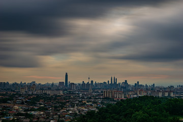 kuala lumpur over view from bukit ampang with dramatic rain cloud