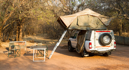 Offroad 4x4 vehicle with tent in the roof © michaklootwijk