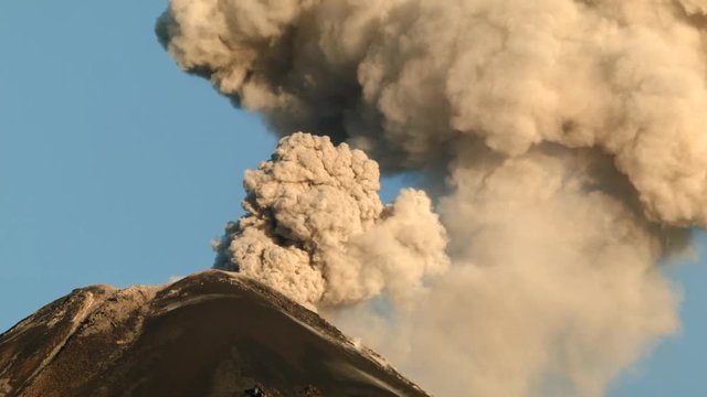 Reventador Volcano erupting in the early morning, September 2016. The mountain is situated in a remote part of the Ecuadorian Amazon surrounded by rainforest. 