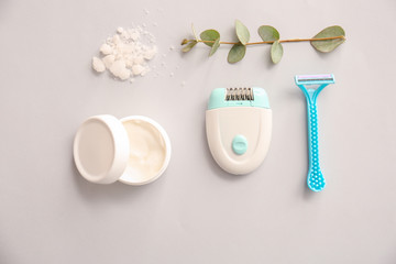 Set for hair removing with cosmetics on light background