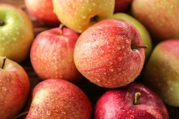 Ripe juicy apples with water drops, closeup