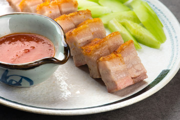 Siu Yuk or crispy roasted belly pork Chinese style